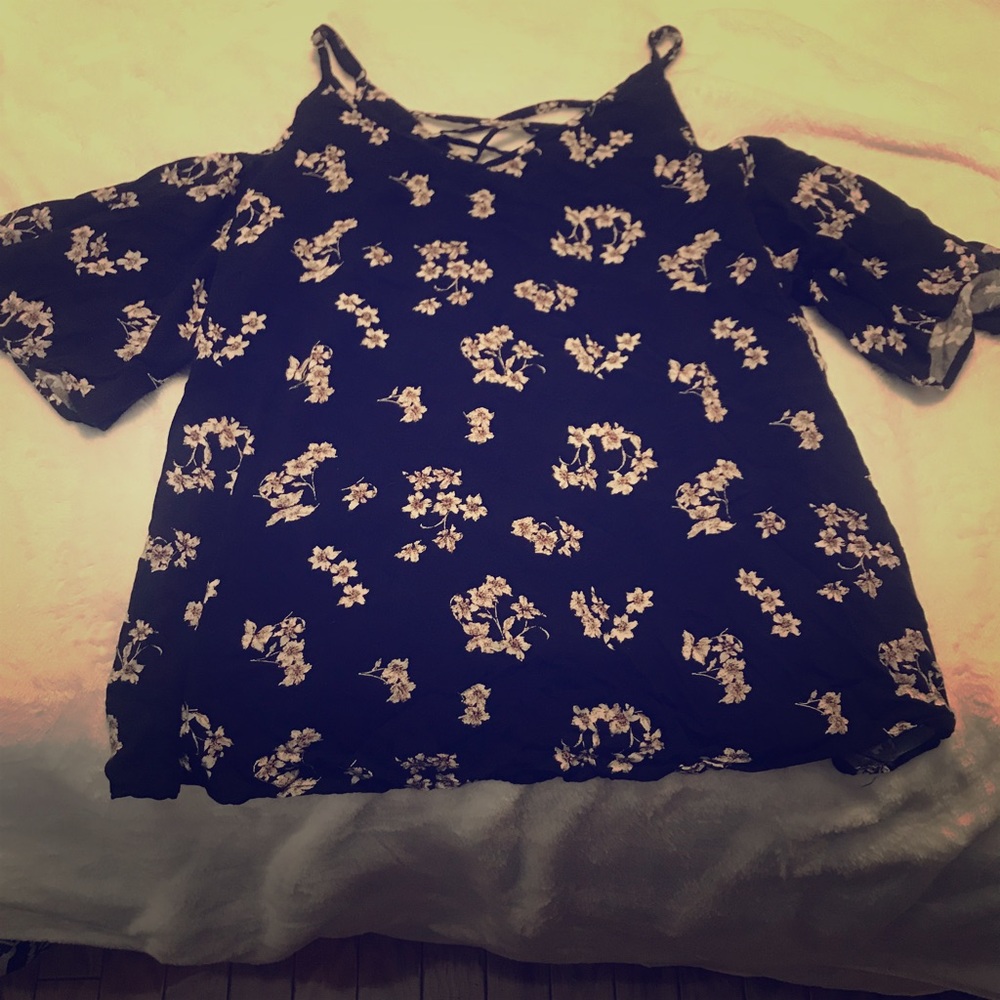 Floral blouse with cut out sleeves. Worn once.